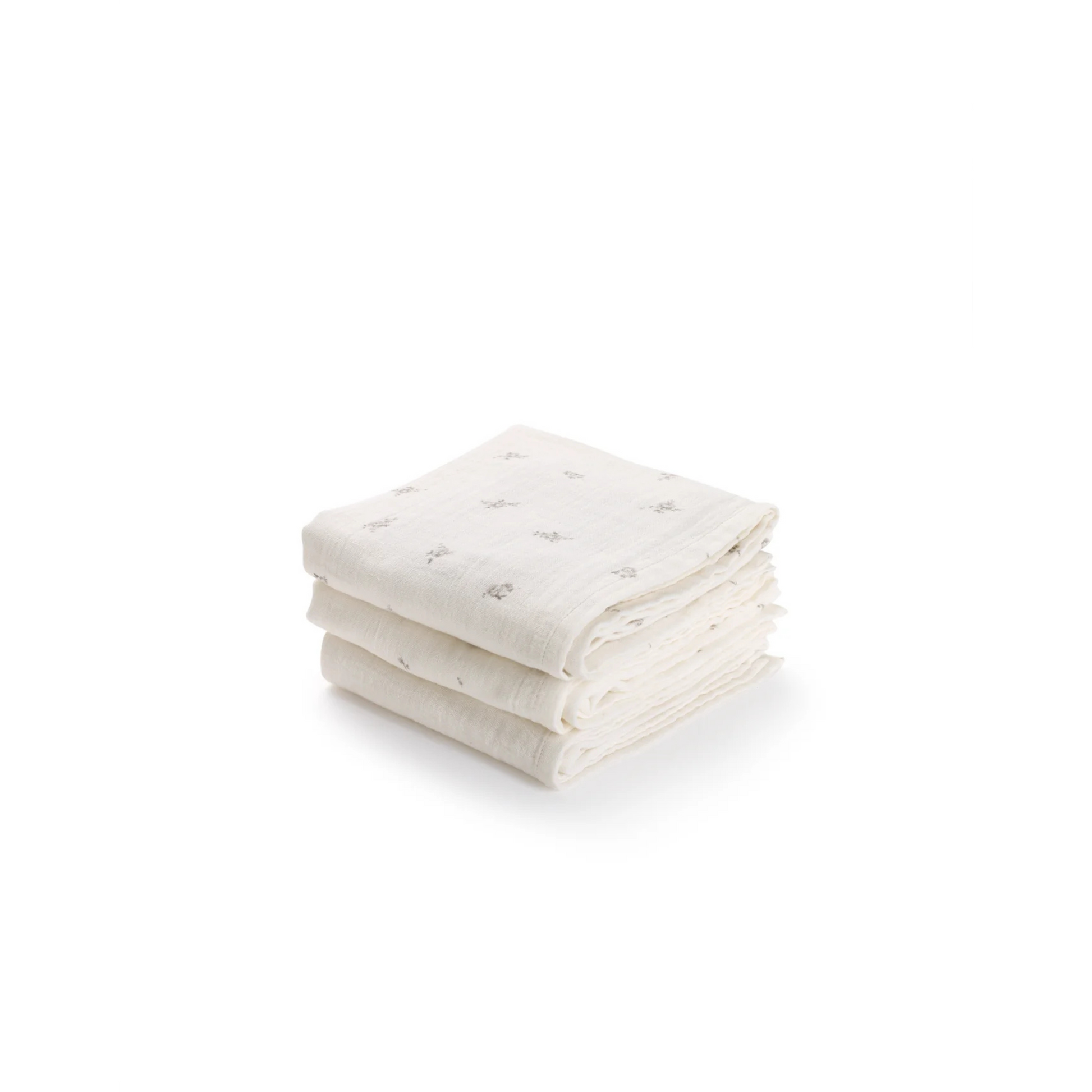 Soft and versatile muslin squares in cream, taupe rosebud, and taupe rose prints.