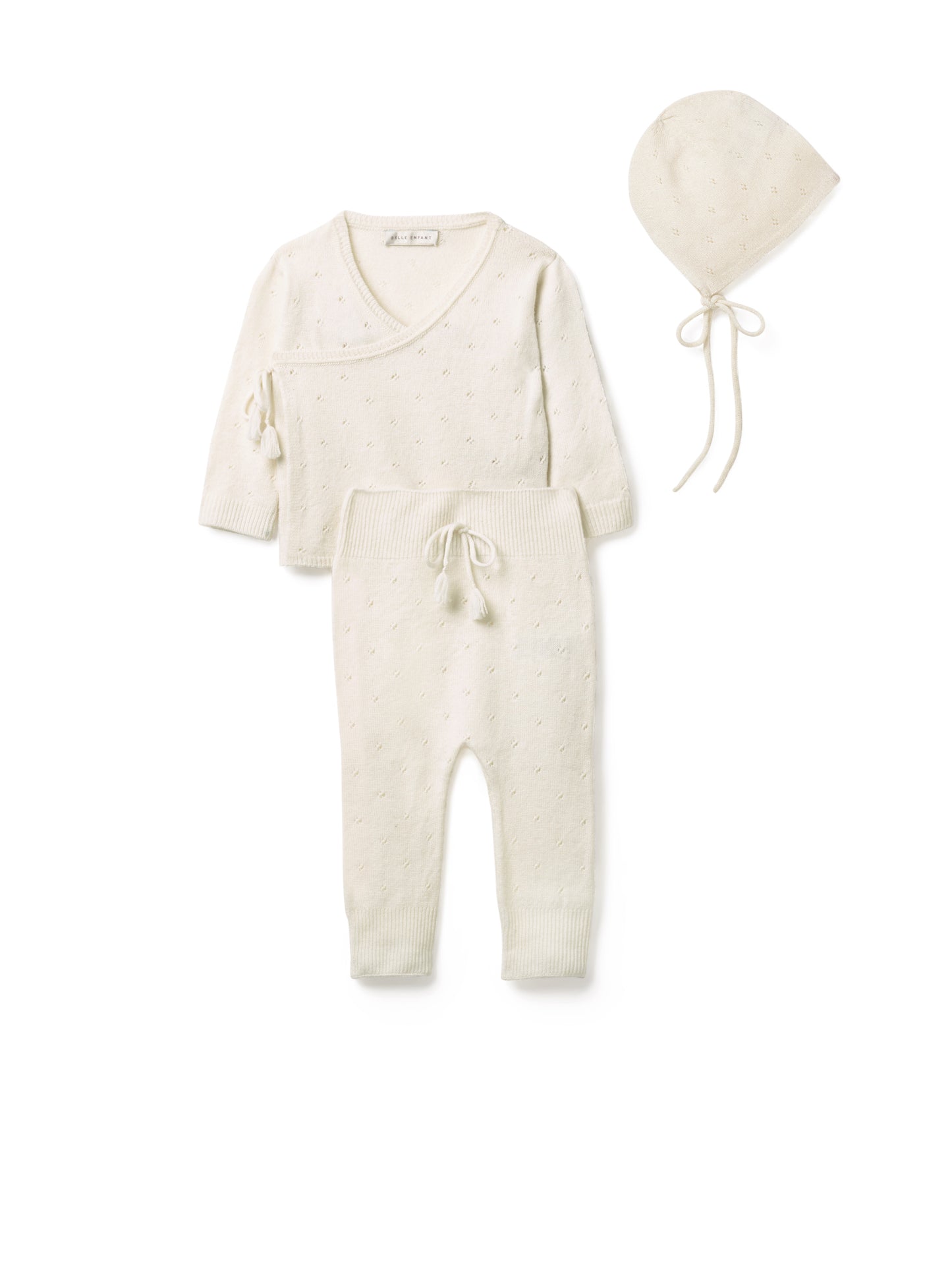 Merino Cashmere Pointelle Wrap Top, Leggings, and Bonnet in Snow White.