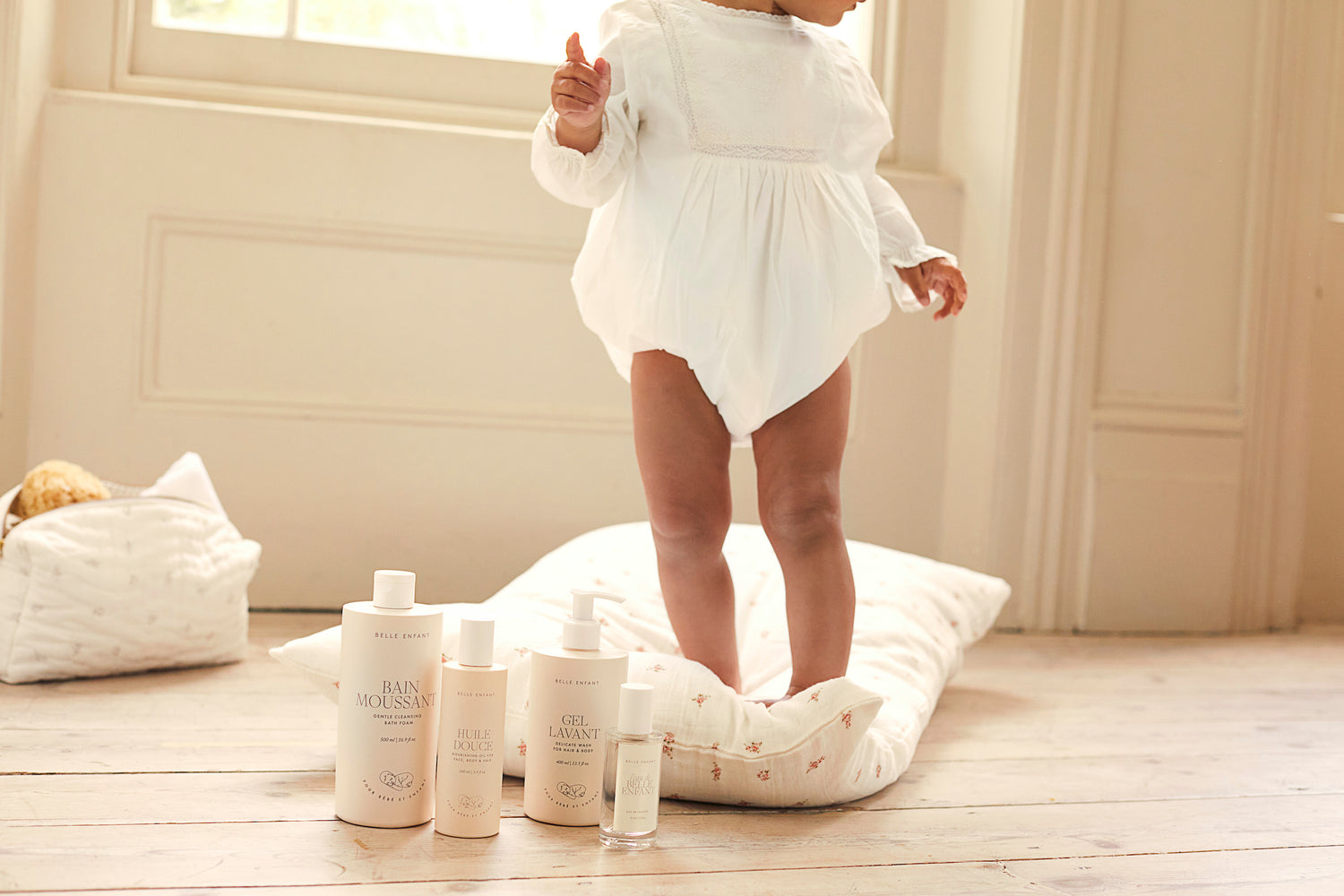 Baby enjoying Belle Enfant Beauté Bath & Body Collection. Vegan, hypoallergenic, and perfect for sensitive skin.
