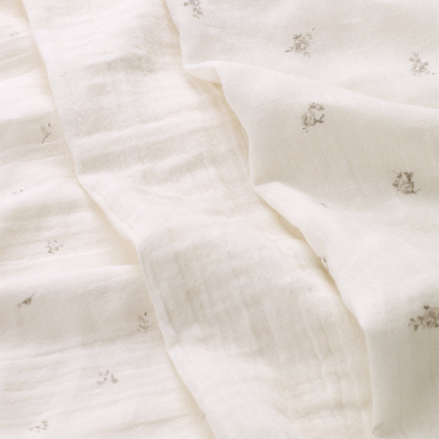 Belle Enfant muslin squares in cream, taupe rosebud, and taupe rose prints