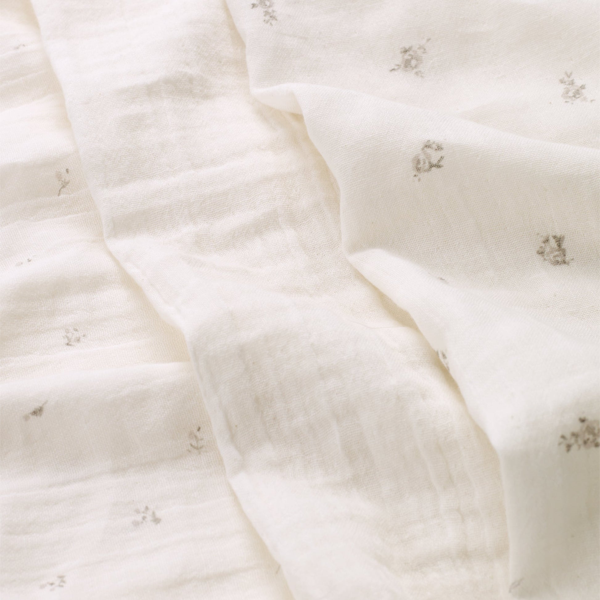 Belle Enfant muslin squares in cream, taupe rosebud, and taupe rose prints