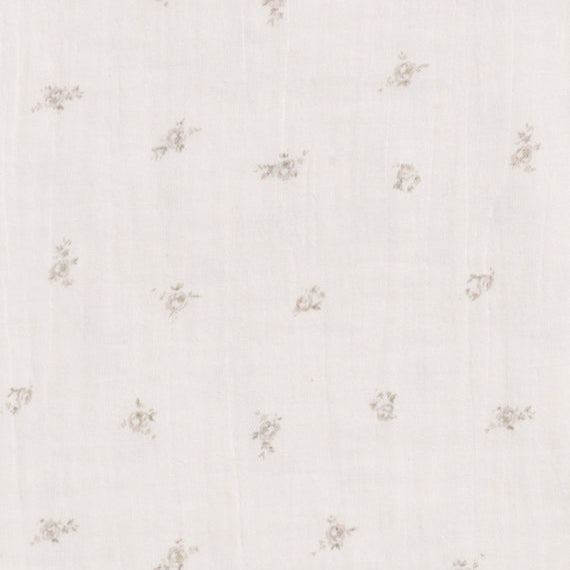 Close-up of the soft 100% cotton muslin fabric in Taupe Rose print.