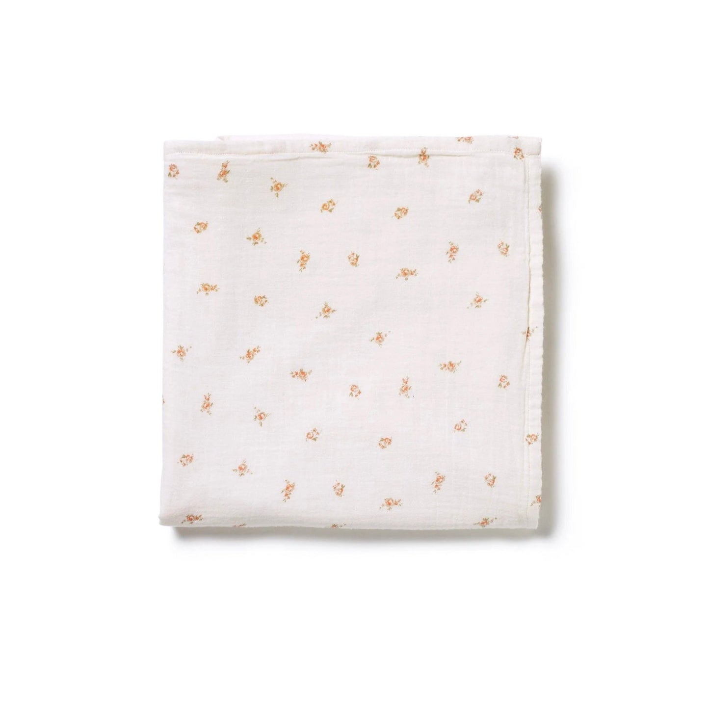 Neatly folded 100% muslin cotton swaddle in delicate pink rose print