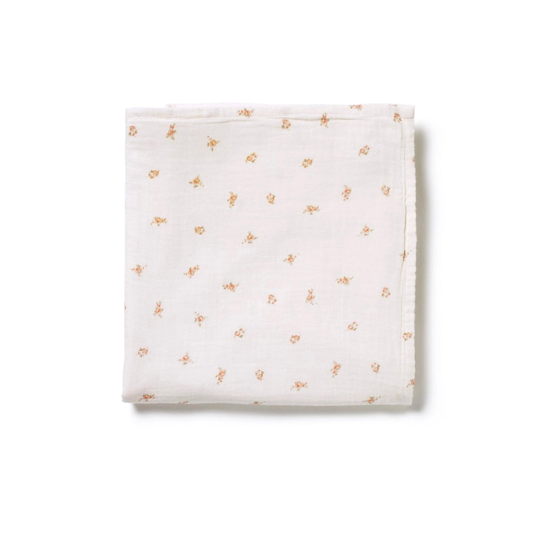 Neatly folded 100% muslin cotton swaddle in delicate pink rose print