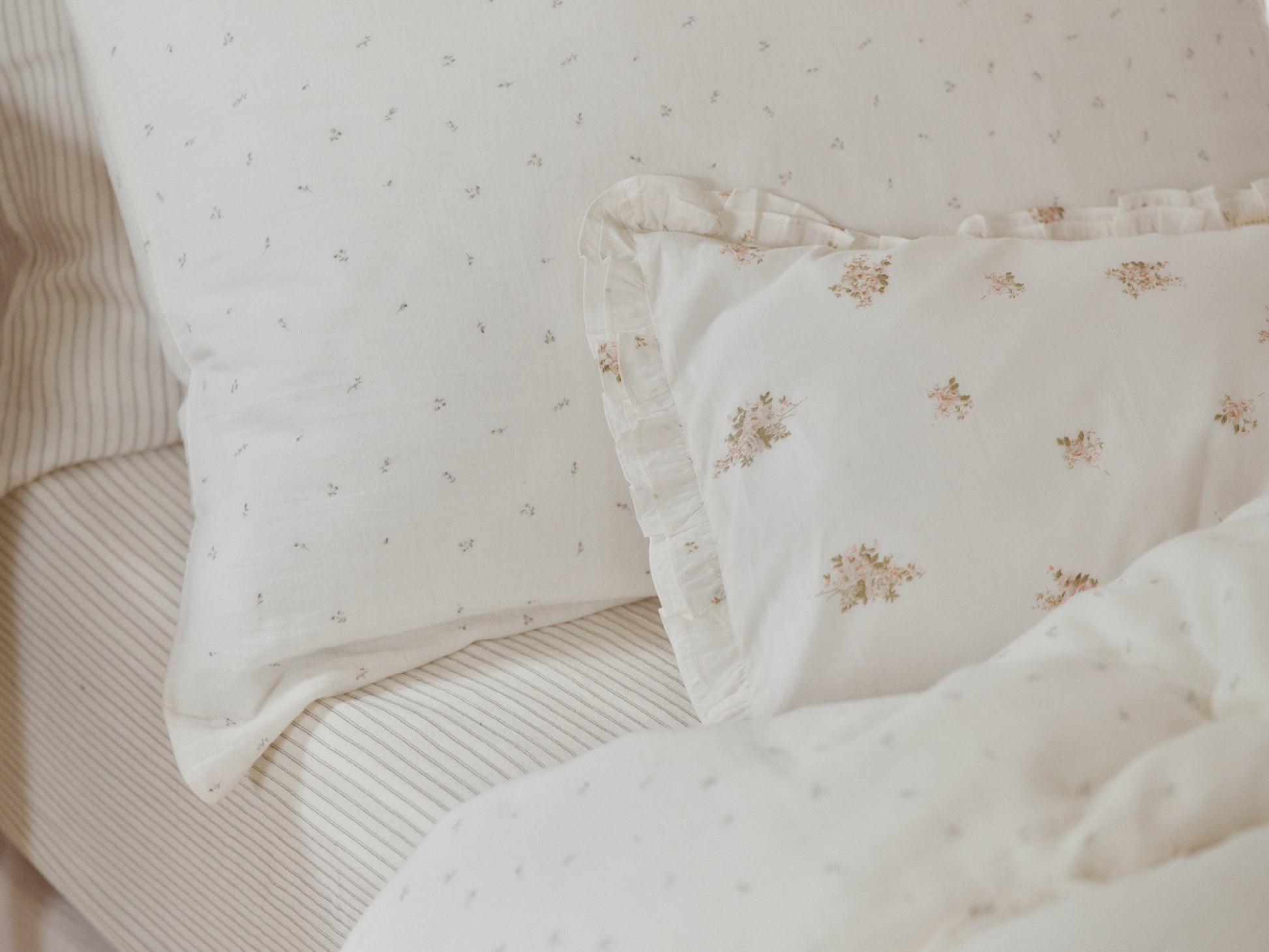 Belle Enfant Taupe Ticking Stripe fitted sheet paired with rosebud duvet set