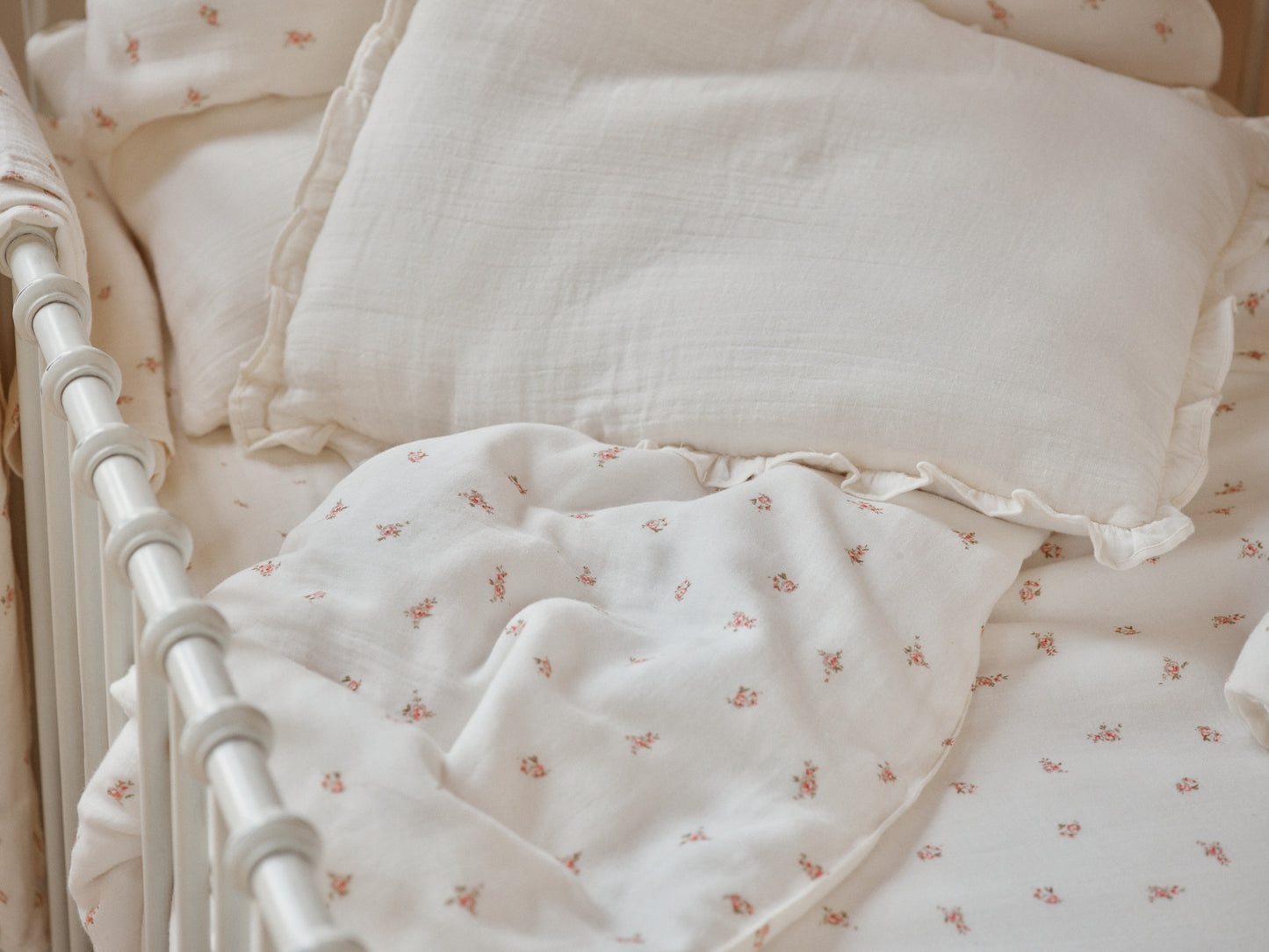 Belle Enfant Pink Rose duvet cover set with pillowcase, displayed in a serene nursery