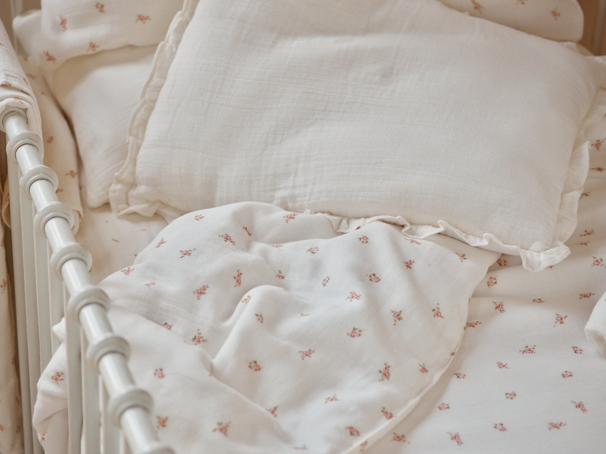 Belle Enfant Pink Rose duvet cover set with pillowcase, displayed in a serene nursery