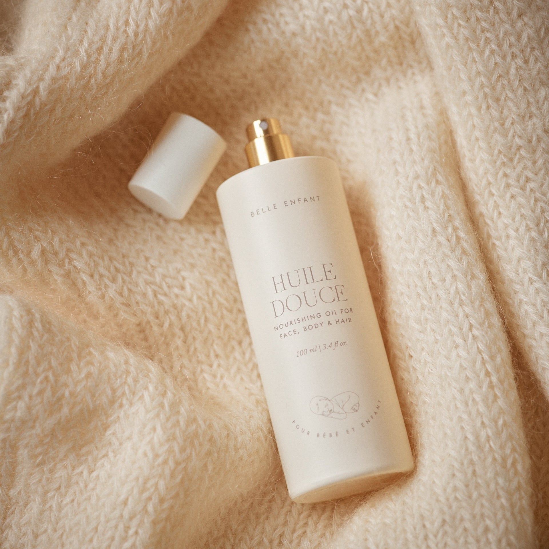 Nourishing Belle Enfant Baby Oil for face, body and hair. Vegan, plant-based, and perfect for timeless elegance.