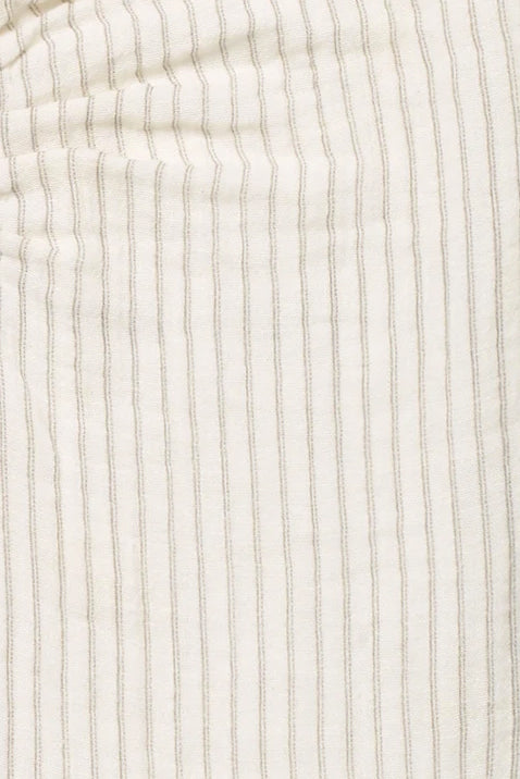 Close-up of the soft 100% cotton muslin fabric and classic stripe print.