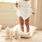 Baby enjoying Belle Enfant Beauté Bath & Body Collection. Vegan, hypoallergenic, and perfect for sensitive skin.