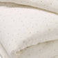 Close up of delicate rosebud printed duvet set for children