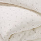 Close up of 100% cotton taupe rose printed duvet set for children