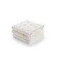 Belle Enfant muslin squares in cream, pink rosebud, and pink rose prints, neatly folded.